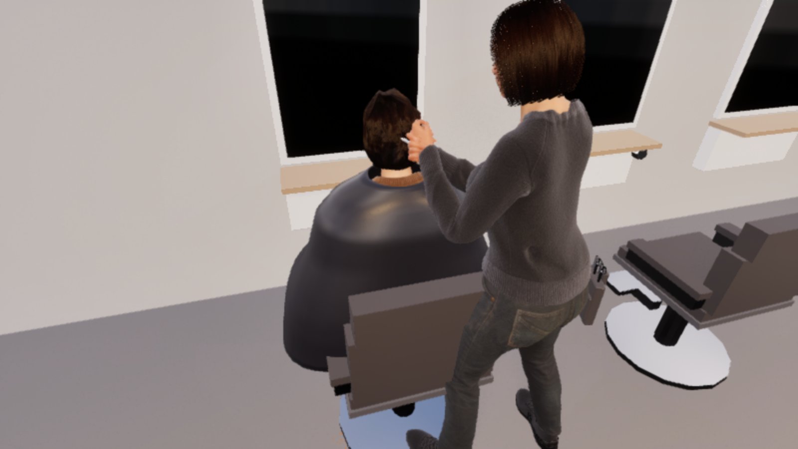 From above and behind, a stylist with a dark bob and grey jumper works at the back of a seated customer's head, the customer covered in a black cape, in a salon with tall windows.