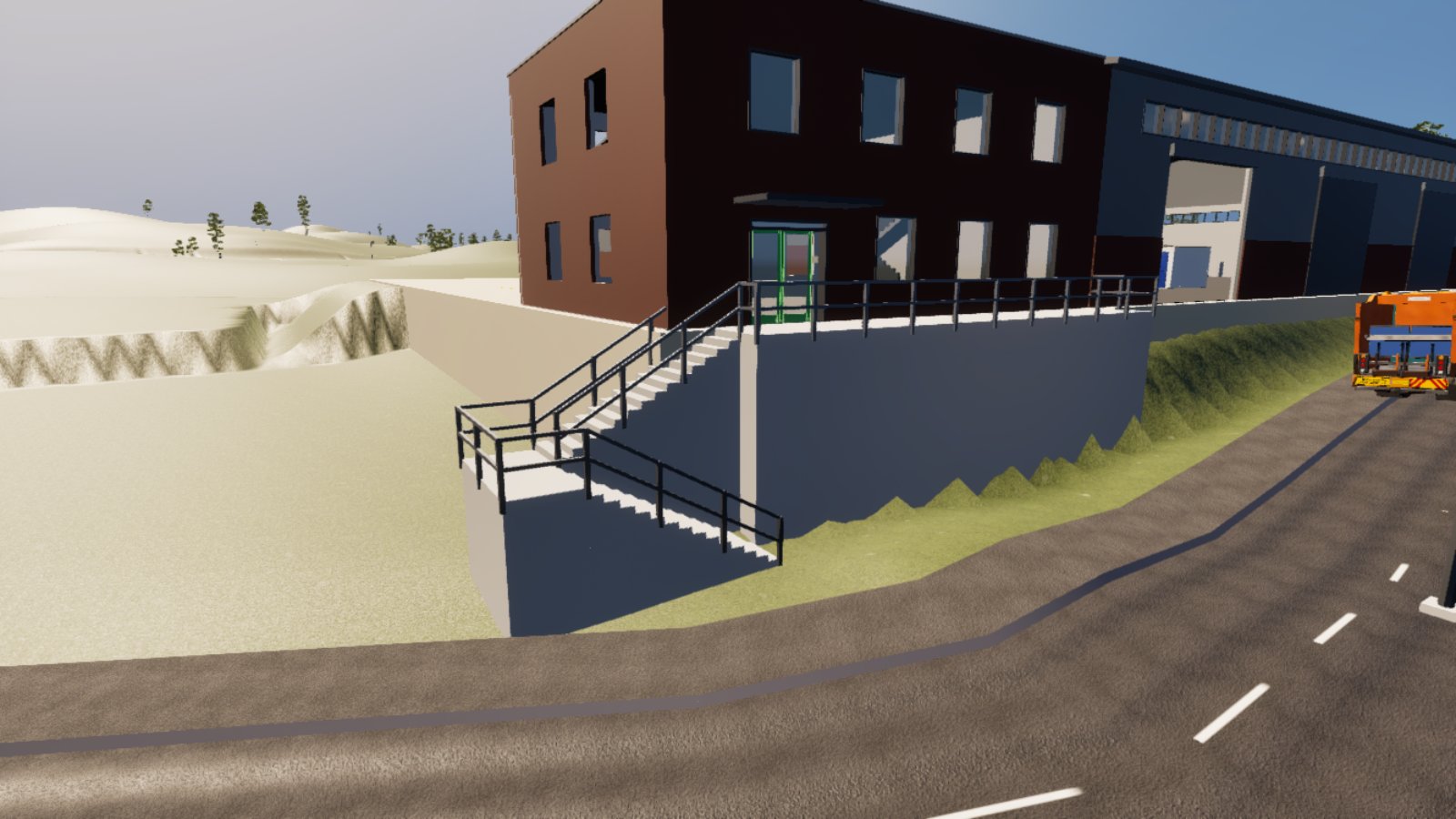 A concrete switchback stair with black tubular handrails running down from a railed terrace in front of a dark brick depot office block to the grass beside a road, with the refuse shed and an orange lorry cab to the right.