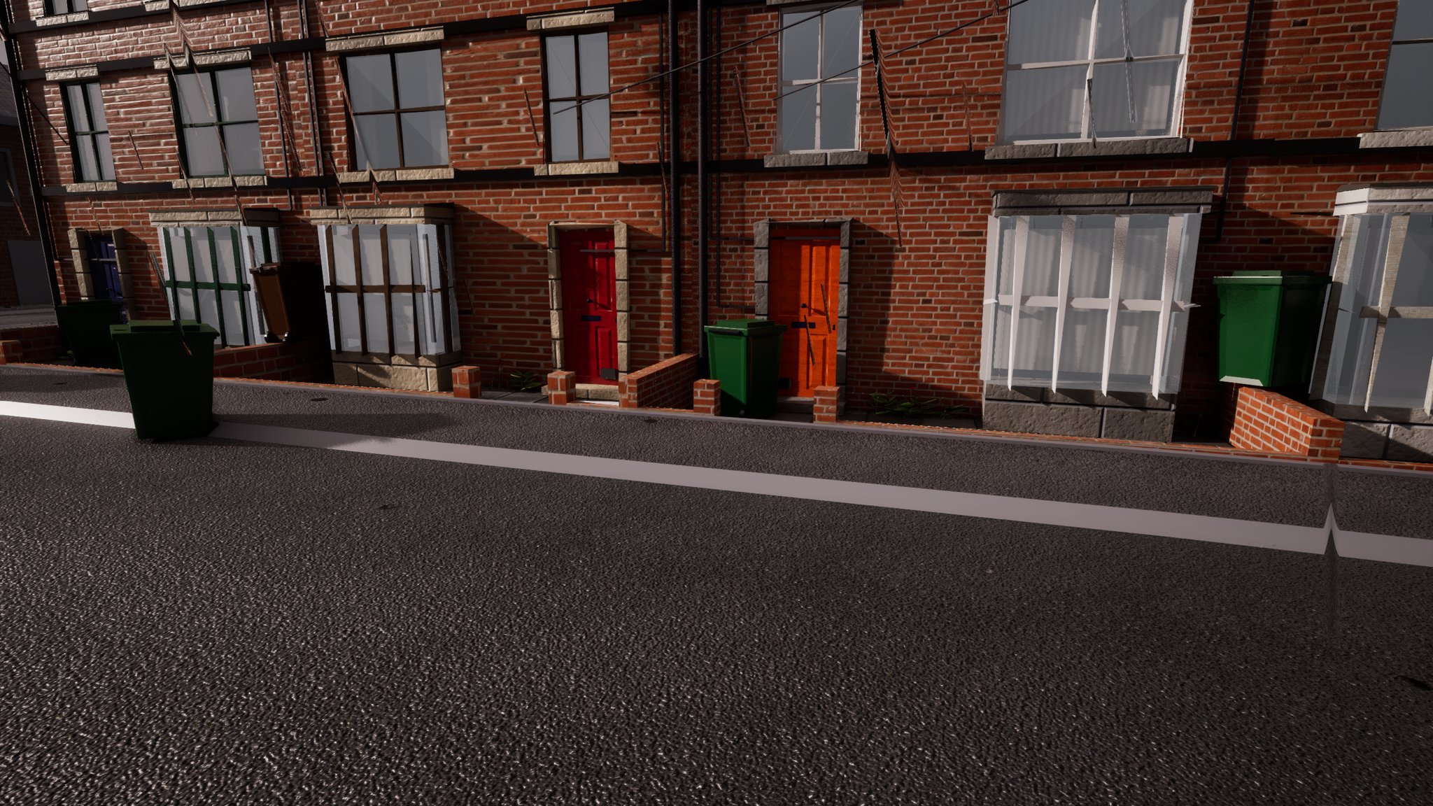 The same terraced street from the same camera, the kerb in front of the house now clear, green wheelie bins by the low garden walls.