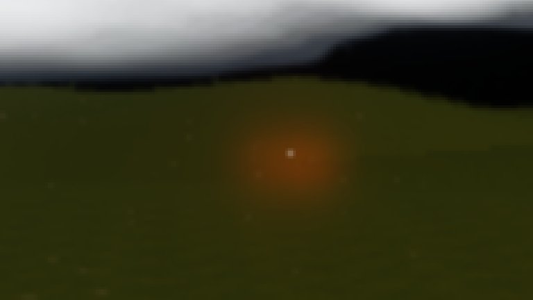 A zoomed, blurred view across dark moorland under white cloud: in the middle of the grass a single small white point with a red-orange glow around it.