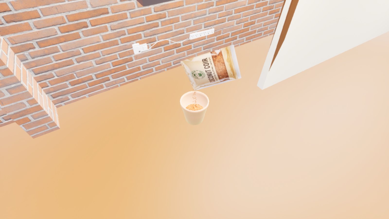 A first-person view down into a bright cellar corner of red brick. A small cream plastic pot sits on the pale floor in the middle of the frame, and just above and to its right a printed coconut coir bag is held tipped on its side, with a thin stream of brown coir falling from its mouth into the pot. The floor washes out to orange and white.