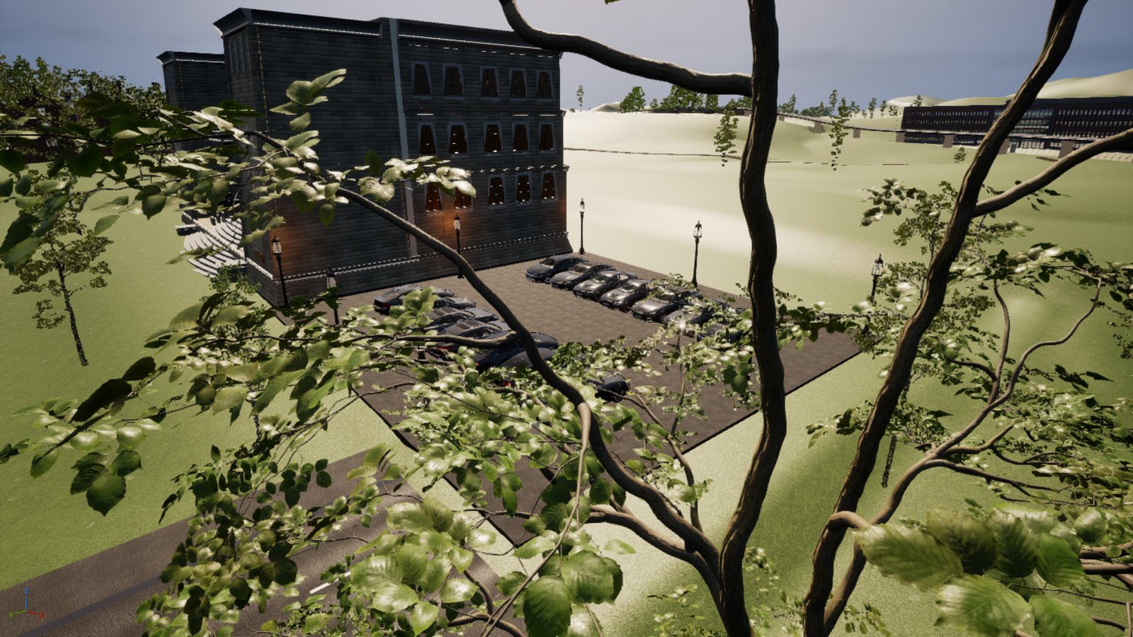 A dark stone building with rows of tall narrow windows, seen from above through the branches of a tree. A tarmac car park beside it holds fourteen black saloon cars parked in two rows of bays, with ornate black lamp posts spaced along the edge and green lawn all around.