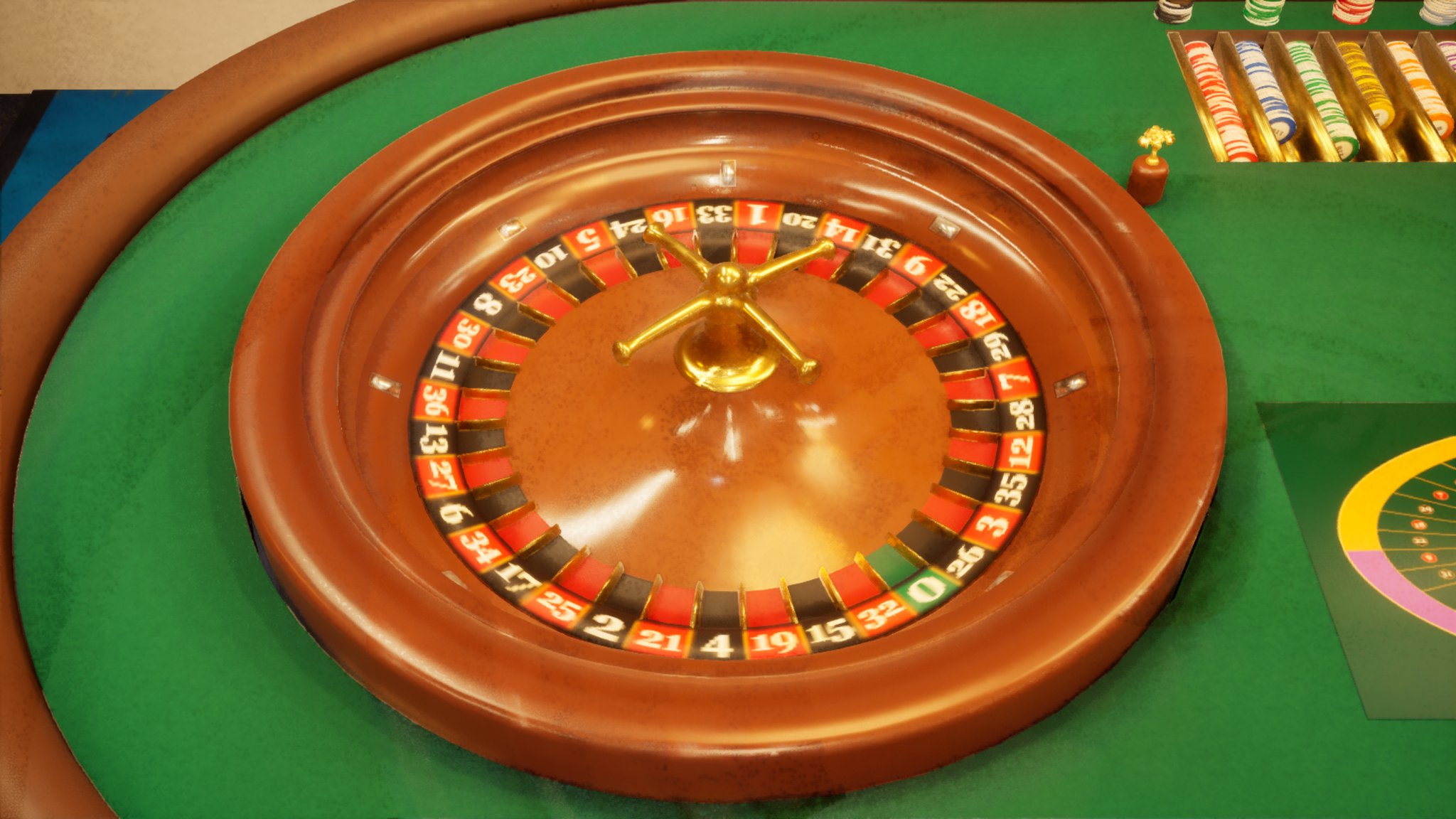 A roulette wheel set into a green baize table, seen from above and slightly to one side. The polished wood bowl holds a numbered ring of red, black and green pockets with a gold turret and spindle at the centre. A rack of stacked coloured chips and a printed betting layout sit at the top right of the frame.
