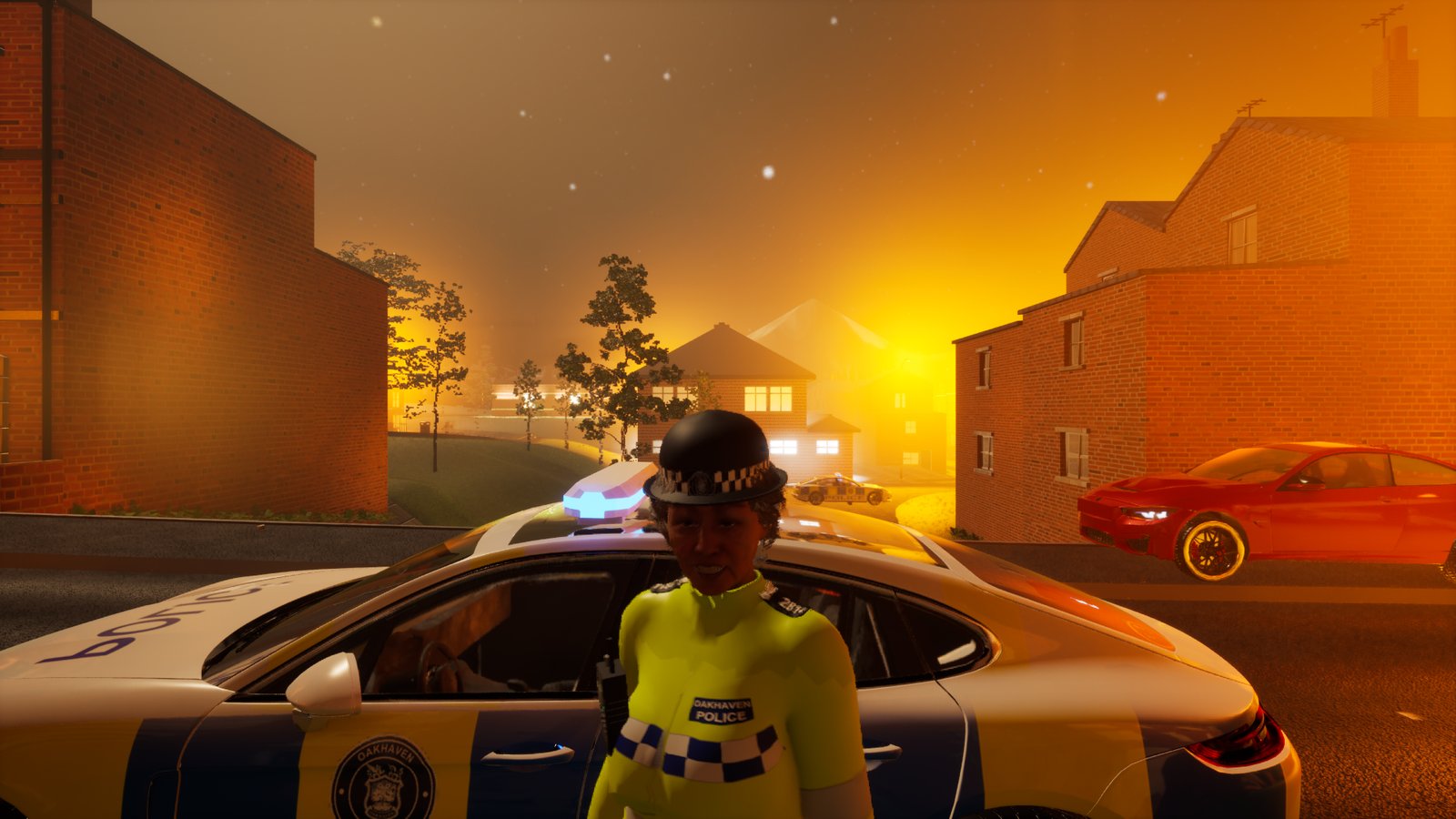 A street of brick houses at night with a police car and an officer in the foreground. Behind the houses the horizon glows bright yellow and orange, as if the sun had only just gone down.