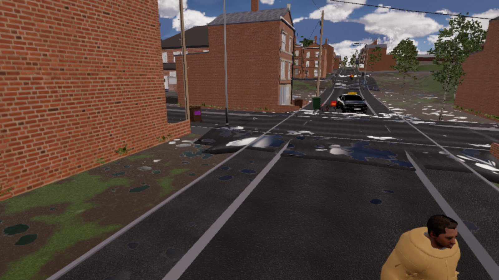 A sunny junction between red-brick terraces under a blue sky with white clouds. A man in a tan jacket walks into the bottom right of the frame; a taxi waits down the road and wheelie bins stand on the pavement.