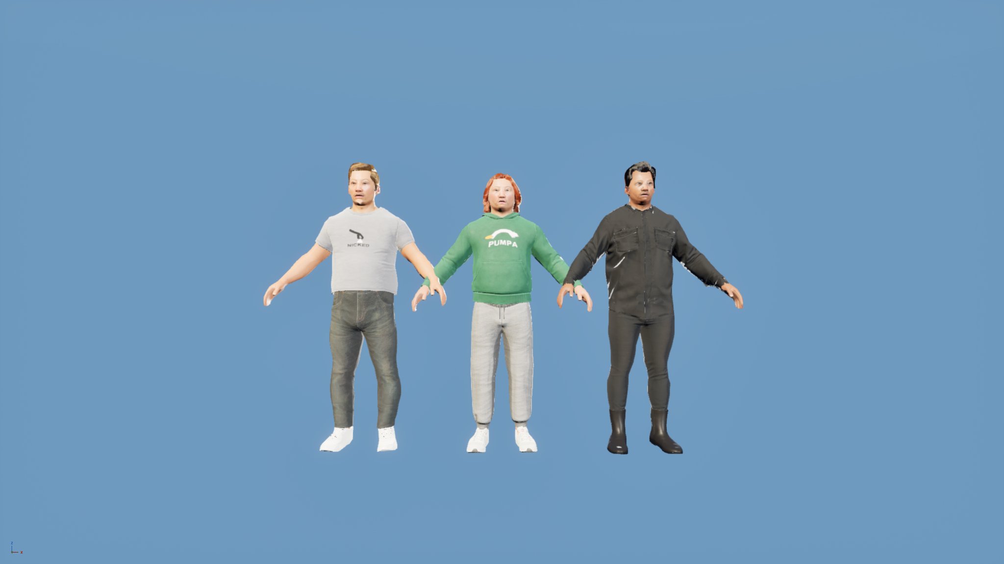 Three men side by side on blue: one with mid-brown hair in a grey tee and jeans, one with copper-ginger hair in a green hoodie and grey joggers, one with slicked-back dark hair in a black shirt, black jeans and black boots.