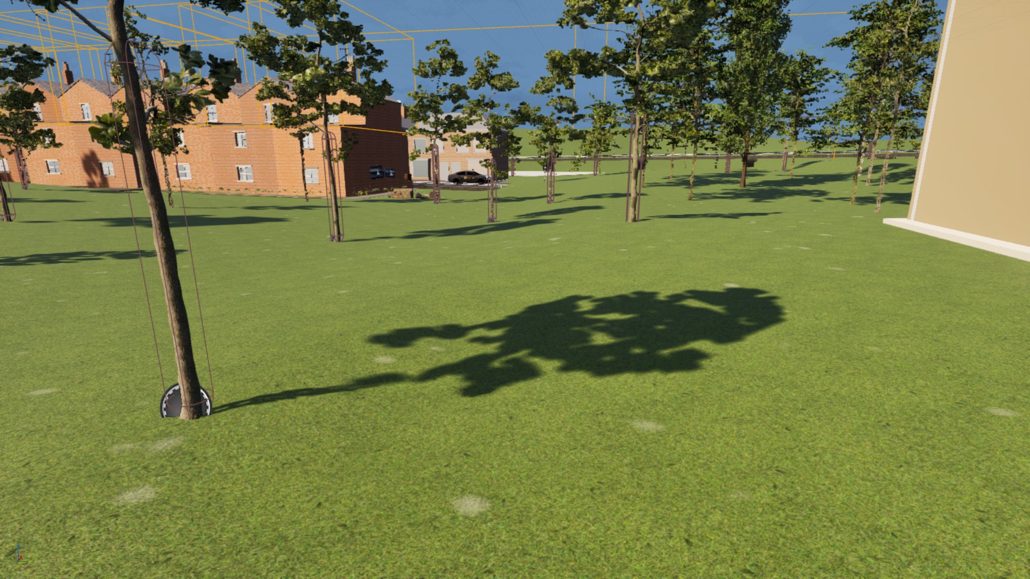 A sunny park of young staked trees in front of red-brick terraces, one tree in the foreground casting a crisp dark shadow across the grass, with orange editor outline boxes in the sky.