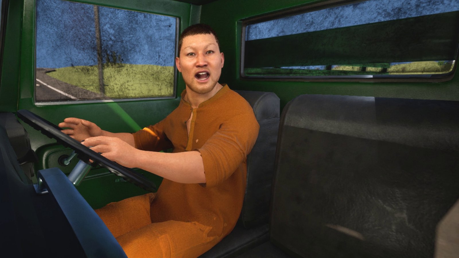 The inside of a bin lorry cab from the passenger side. A man in a burnt-orange council work shirt sits at the wheel with both hands resting on the rim, turned toward the camera with his mouth open mid-word. Green painted metal, a grubby windscreen and side window with road and verge outside, a black bench seat beside him.