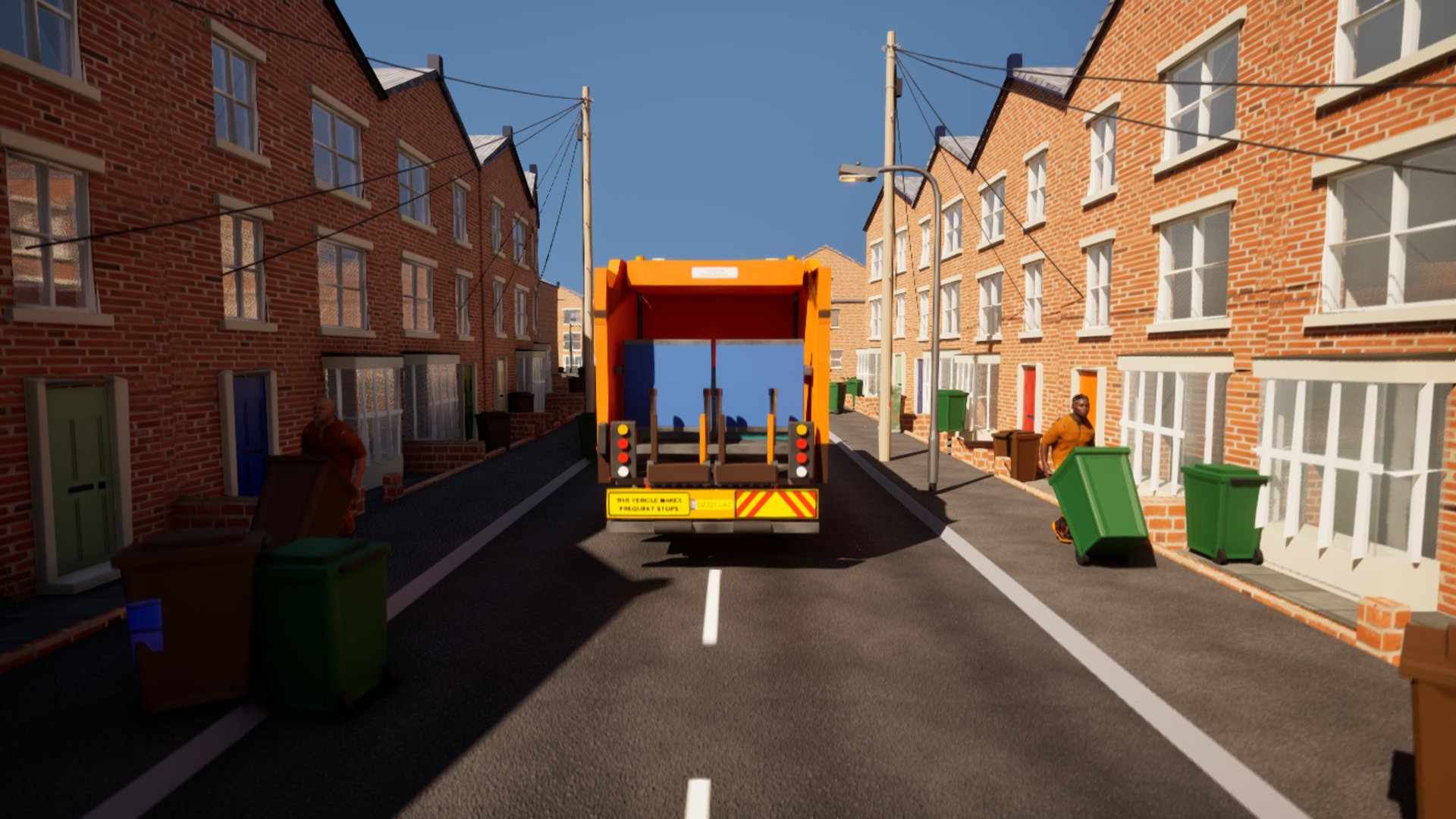 From a drone just above the road: an orange-tailgated bin lorry working a street of red-brick terraces while a loader in orange hi-vis carries a green wheelie bin across.
