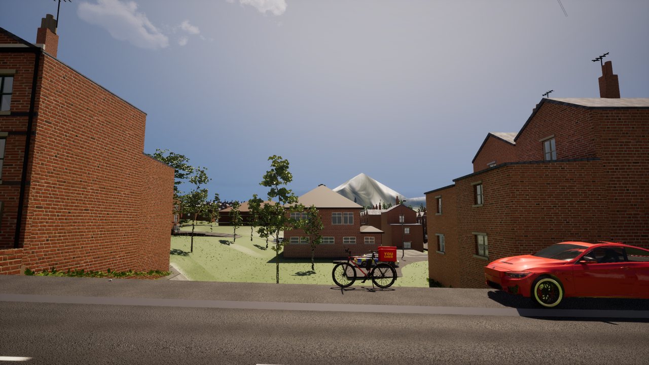 A gap between red-brick houses looking out over grass to a snow-capped peak on the skyline, a delivery bike and a red car in the foreground.